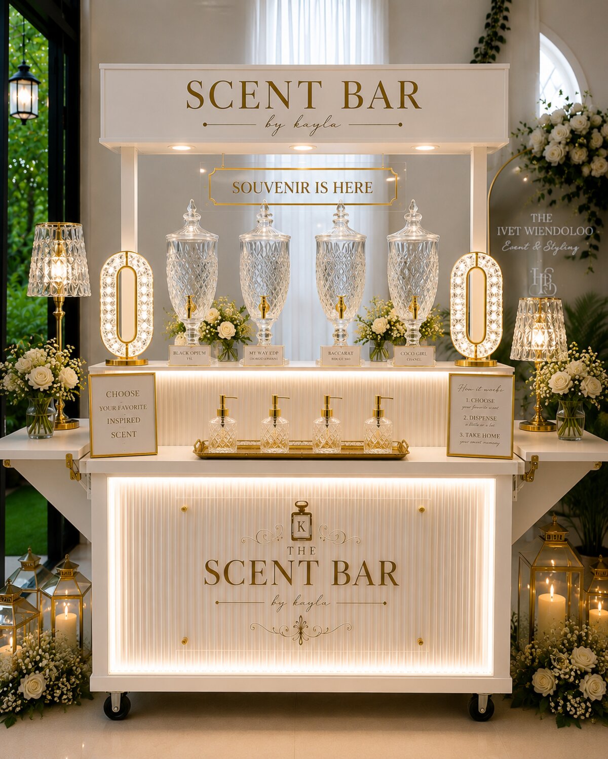 Luxury mobile perfume bar setup with crystal dispensers and gold signage